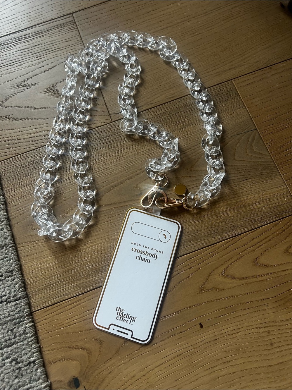 Clear Crossbody Phone Chain with Gold Hardware by The Darling Effect
